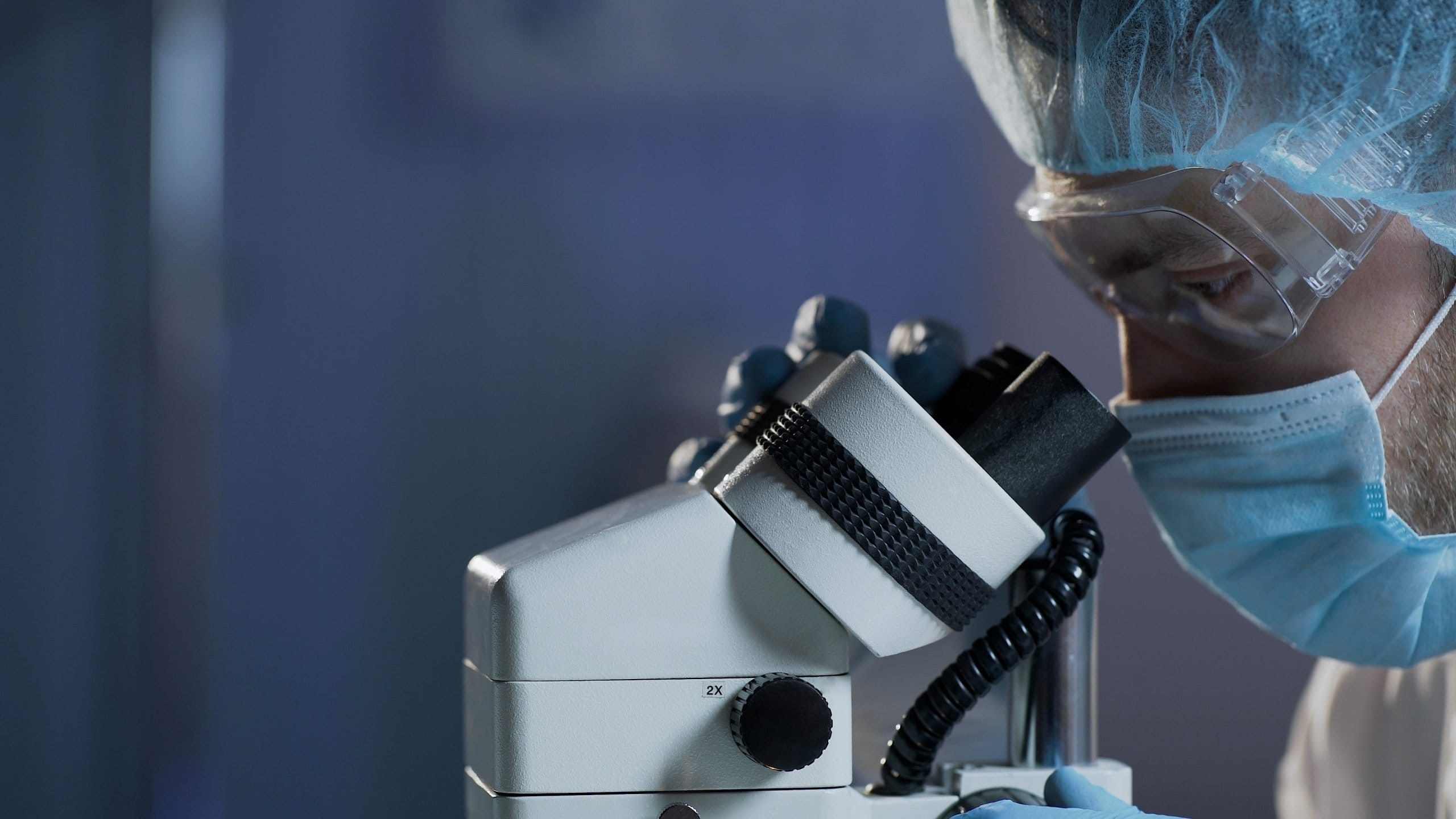 Medical scientist conducting research of blood sample for hematologic diseases