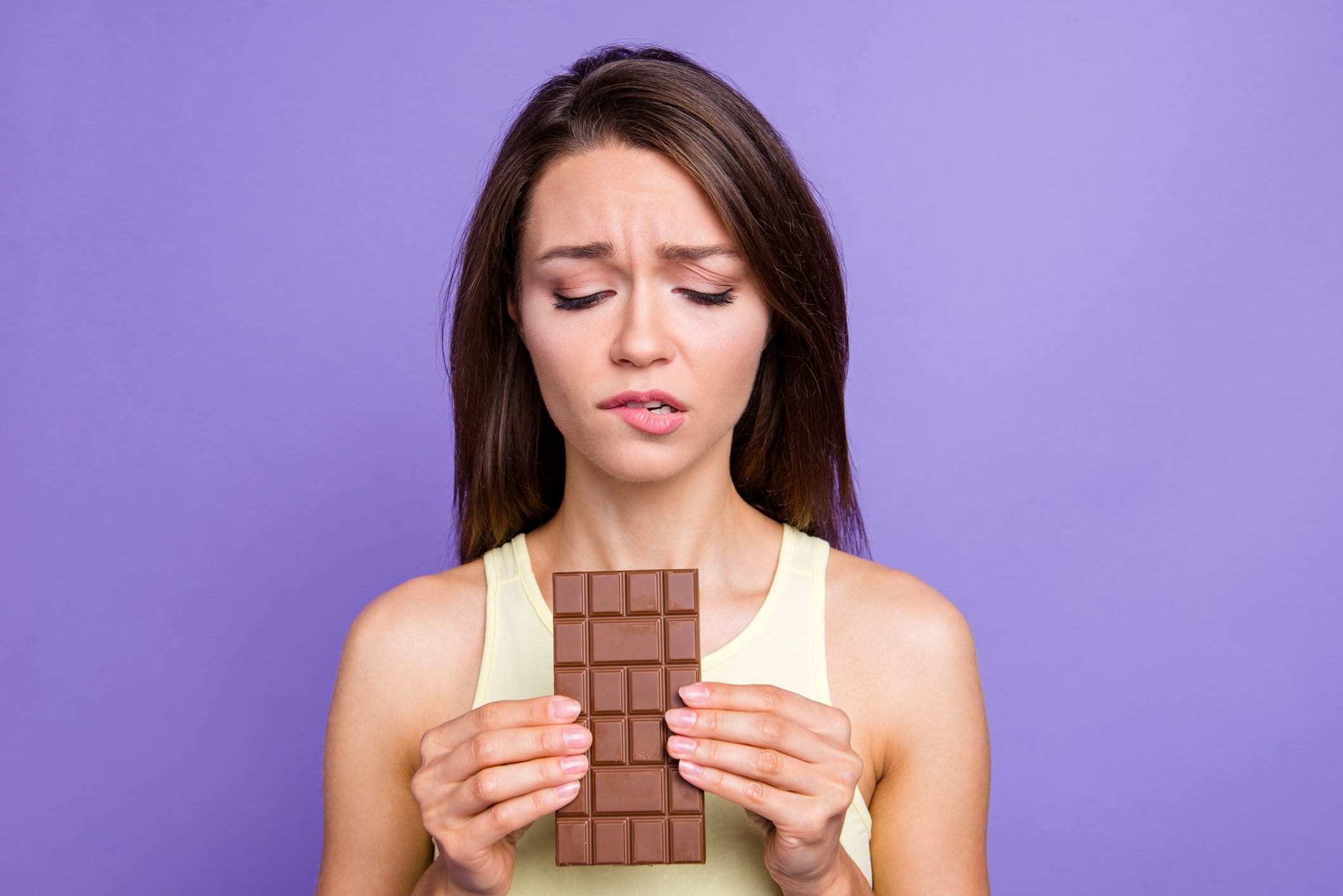 Close up portrait of lady with her brunette hair worried face sh