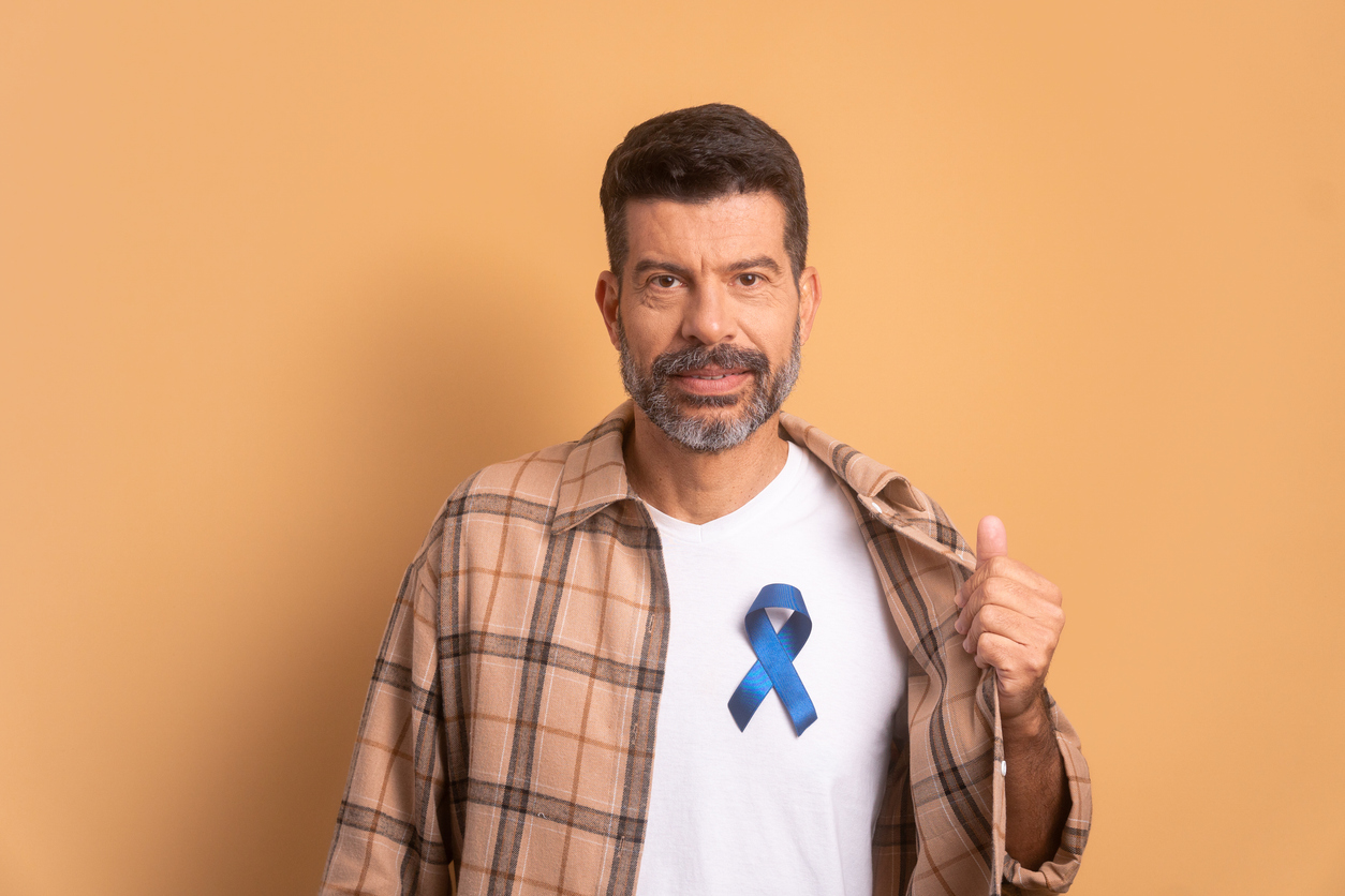 Person wearing blue for colorectal cancer awareness