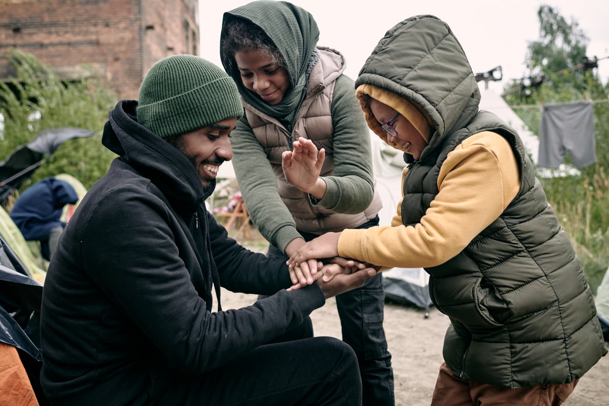 Refugee family for World Refugee Day