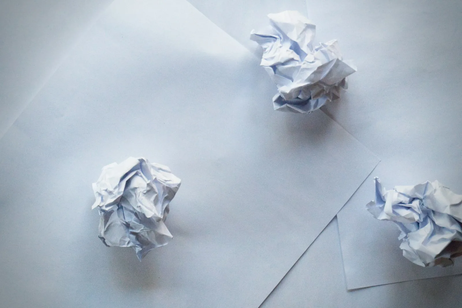 International Day for Failure: crumpled paper balls on a desk