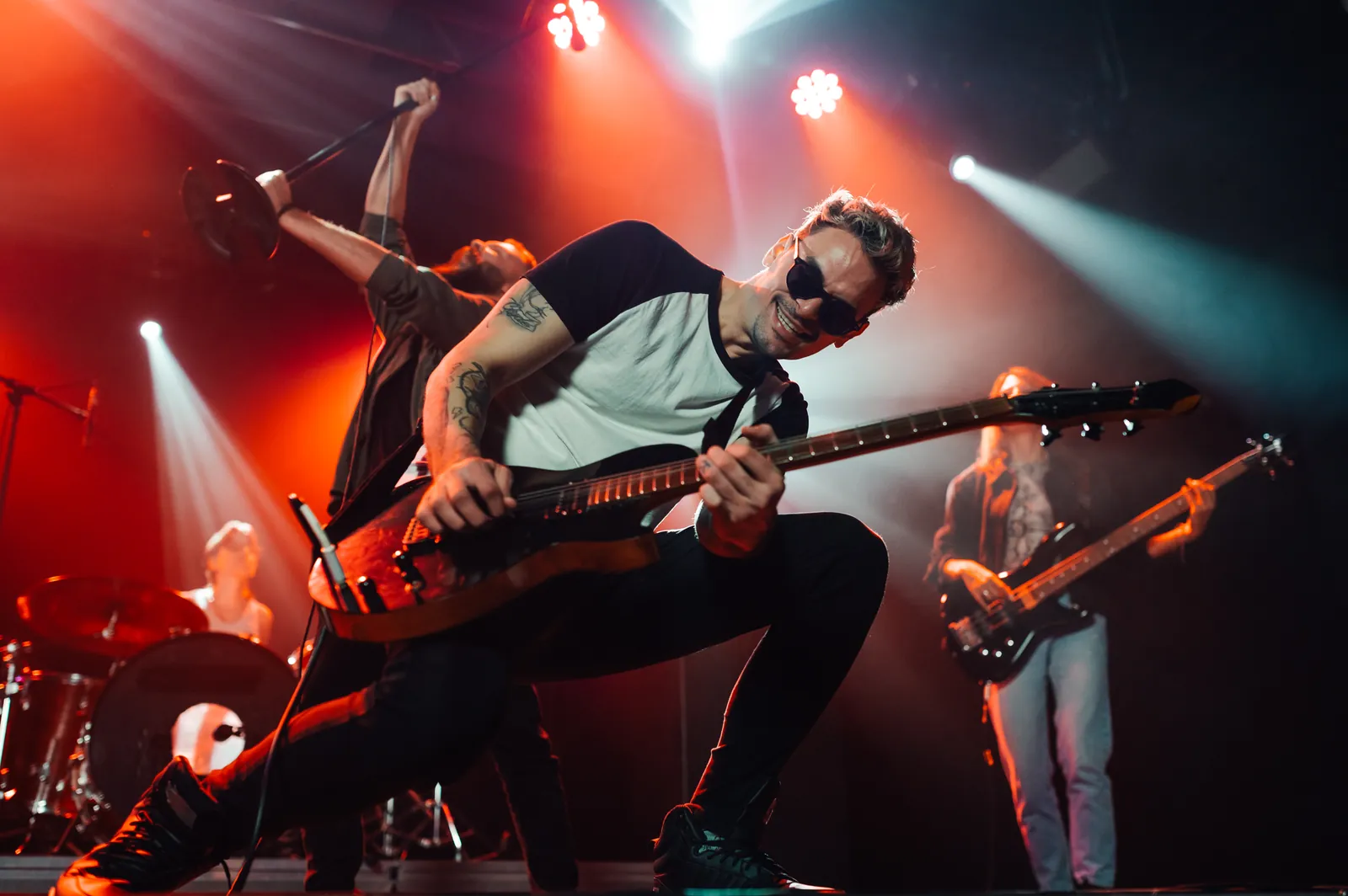 International Rock Day: Rock band guitarist playing live on stage