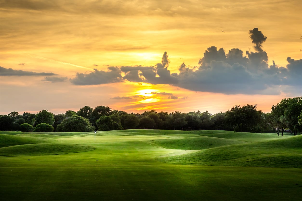 Golf course fairway and green on a sunny day