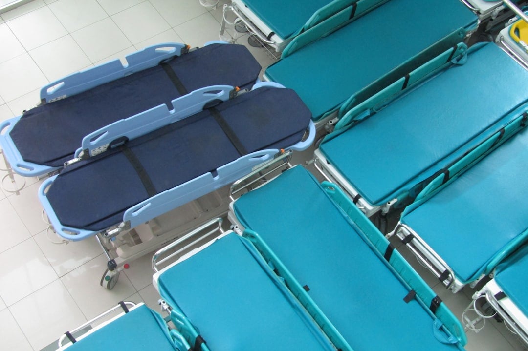 An emergency department nurse caring for a patient in hospital