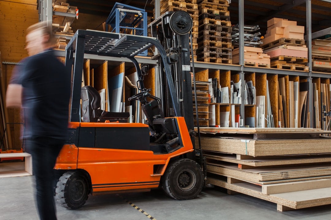Forklift operator working safely in a warehouse
