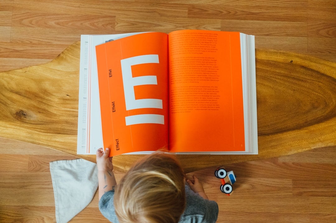 A child reading comics, celebrating National Lincoln Loud Day