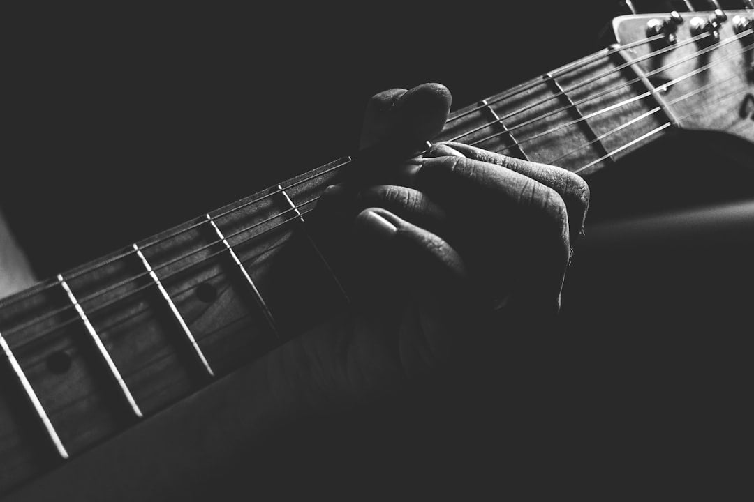 Blues guitarist performing live on stage