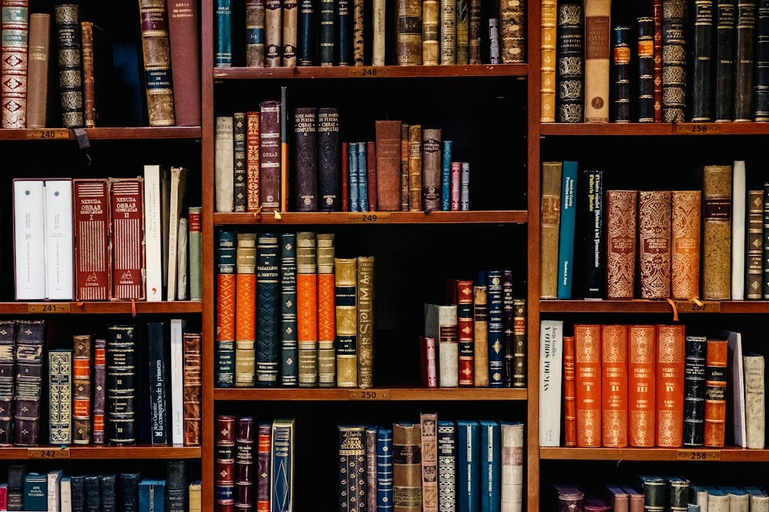 Rows of books on shelves in a library for Church Library Month