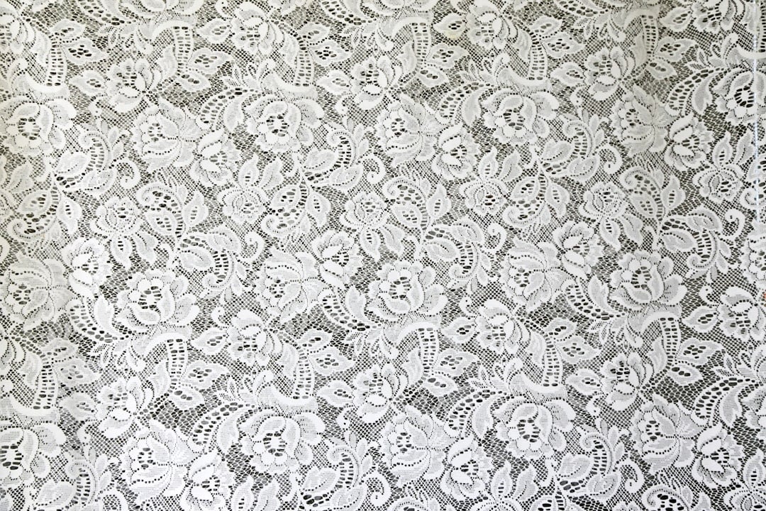 Close-up of intricate handmade lace fabric for National Lace Day