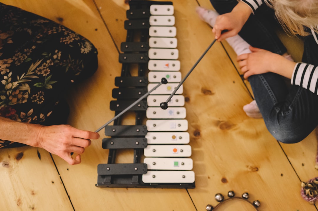 Children playing musical instruments together on Kids Music Day