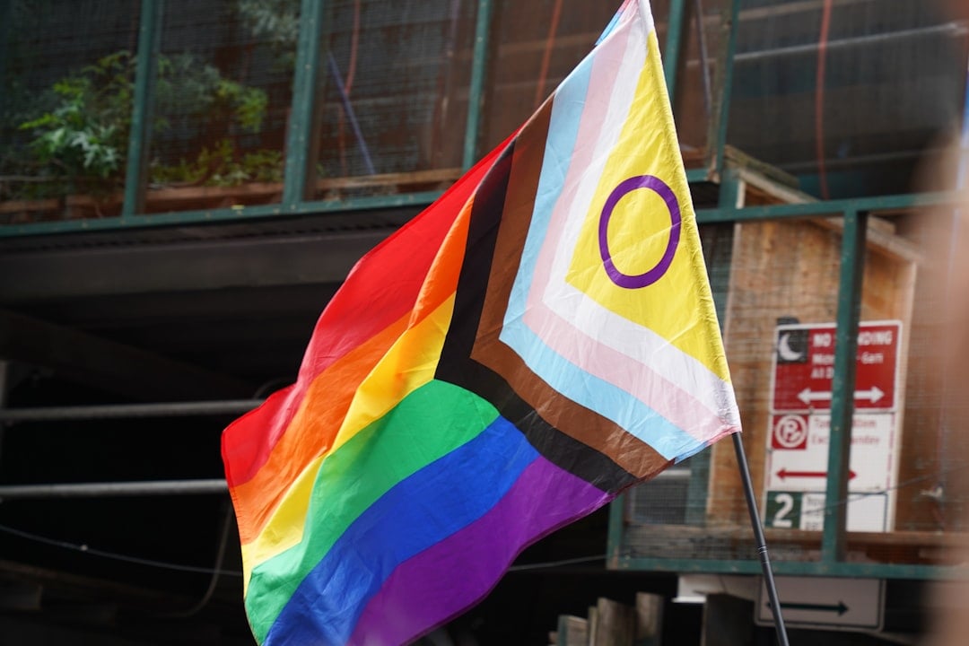Intersex pride flag with yellow background and purple circle