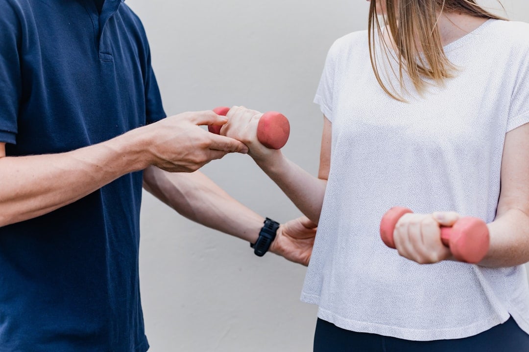 Physical therapist helping a patient with rehabilitation exercises