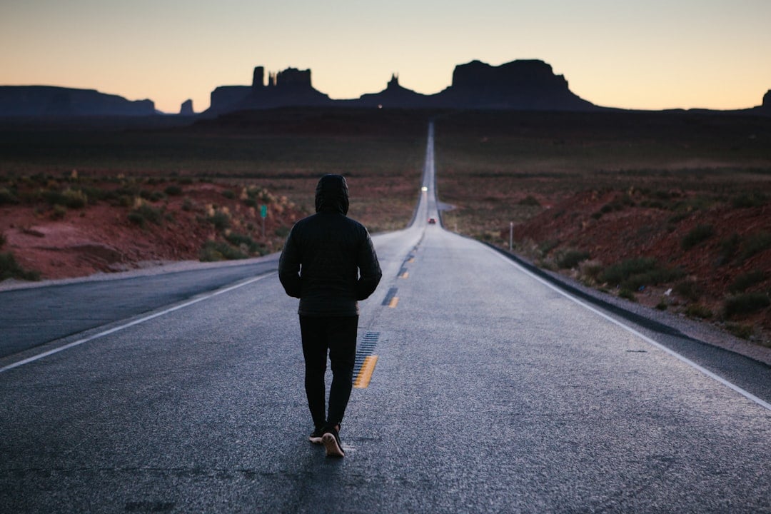 A person taking action at sunrise on National No Excuses Day