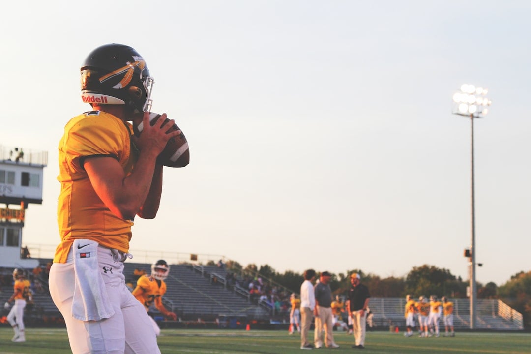 American football player making a catch on National Tight Ends Day
