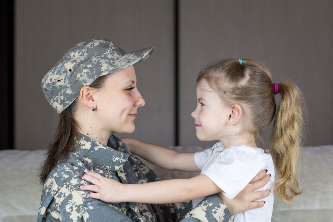 A deployed service member with their family