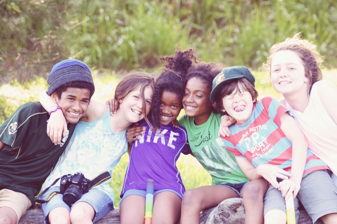 A diverse group of young people celebrating individuality and inclusion
