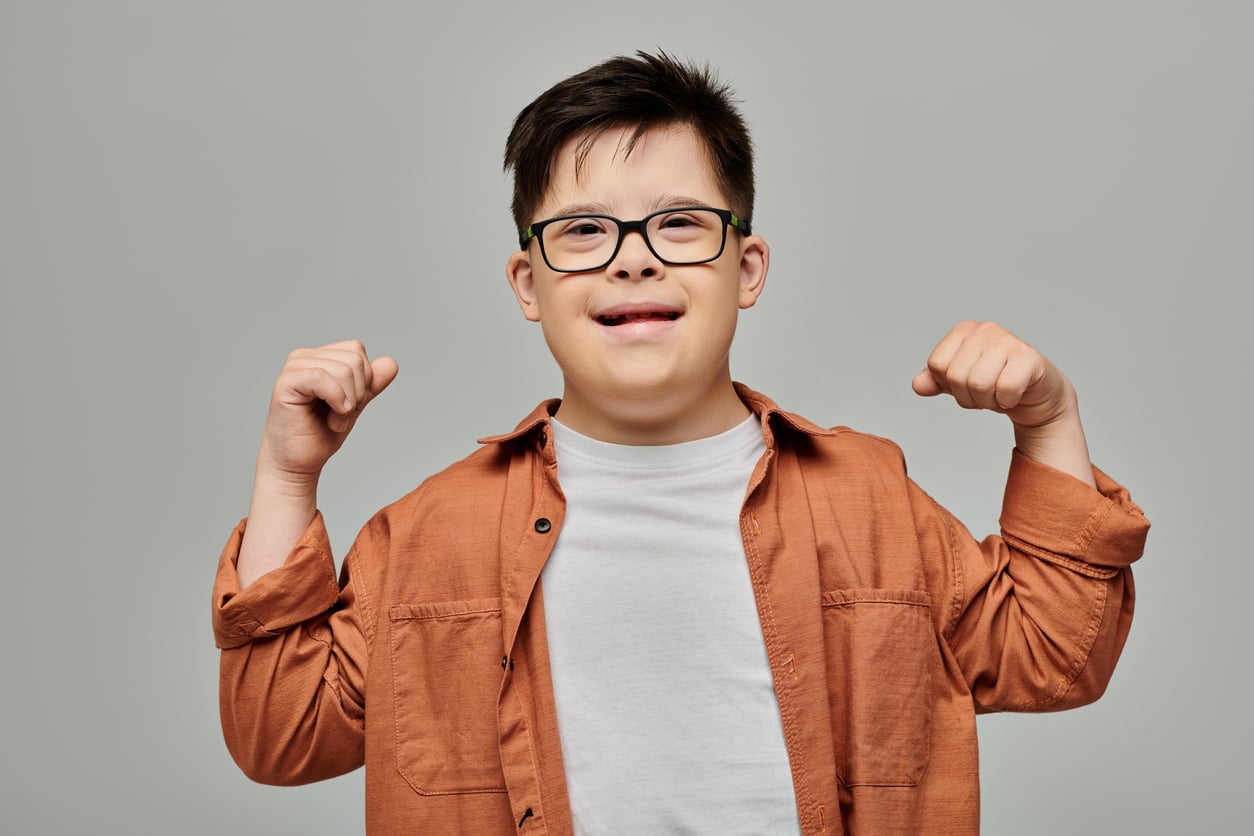 Children with Down syndrome smiling and playing together