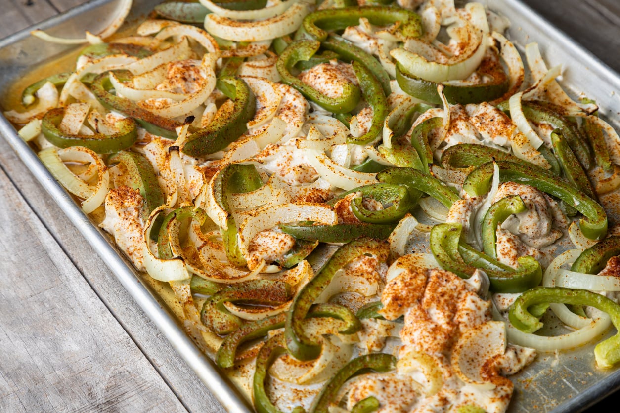 Sizzling fajitas with peppers and onions