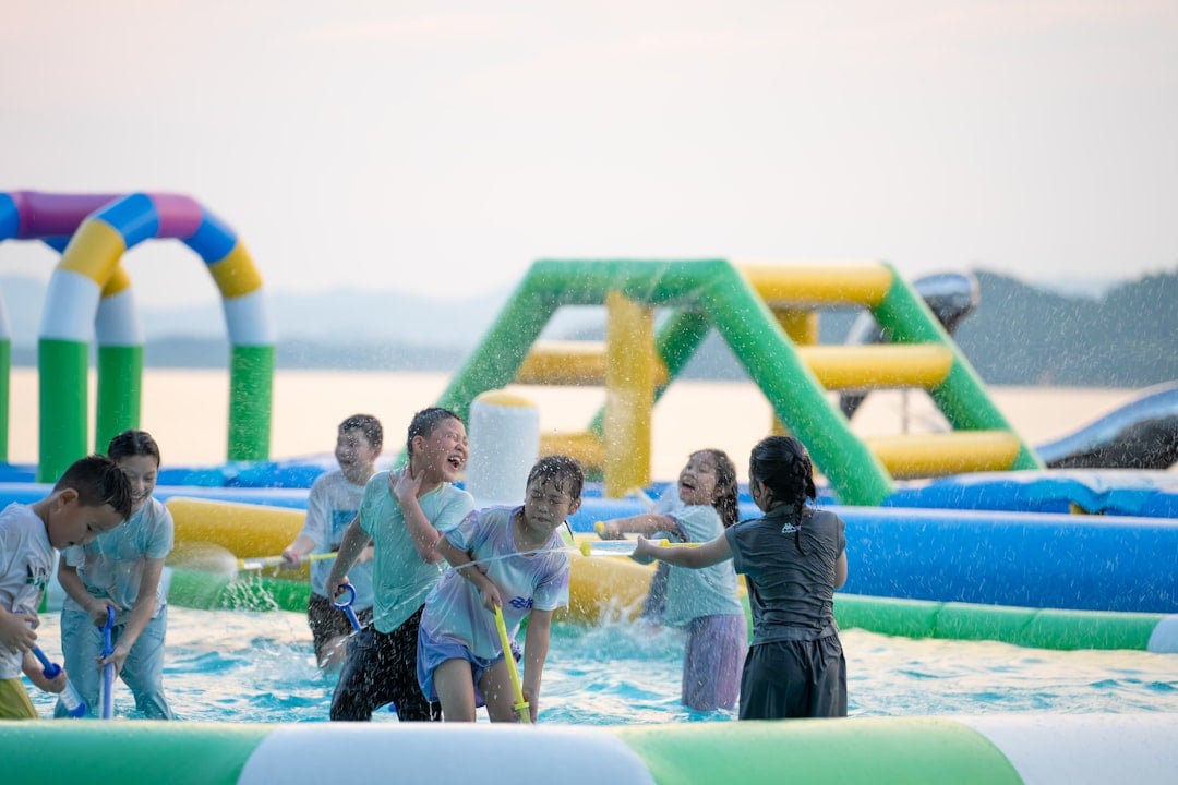 Children trying different sports activities outdoors